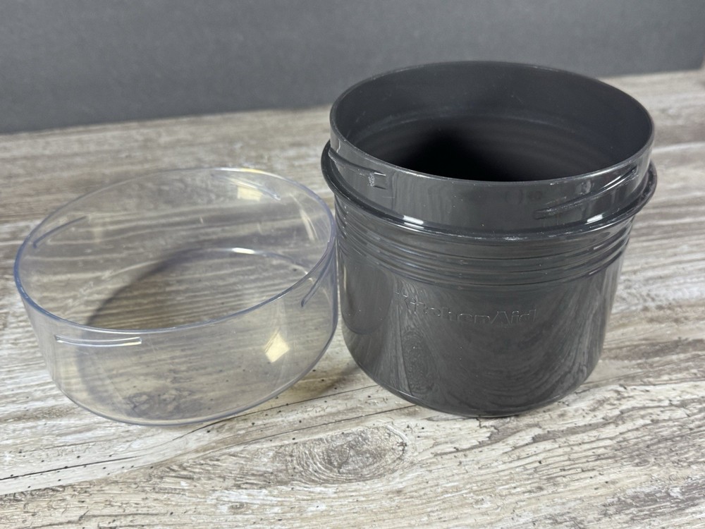 KITCHENAID JUICER SCREENS AND STORAGE CONTAINER. HIGH PULP AND SAUCE SCREEN