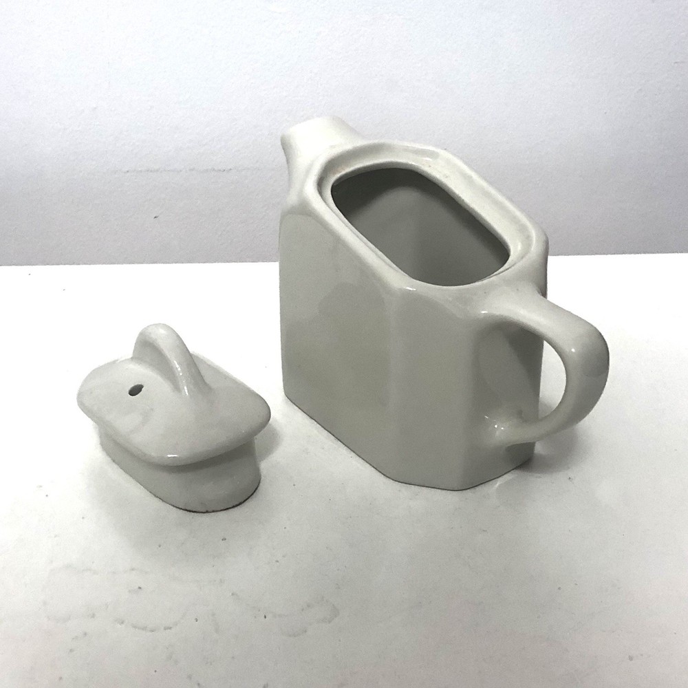 White porcelain plate and pot