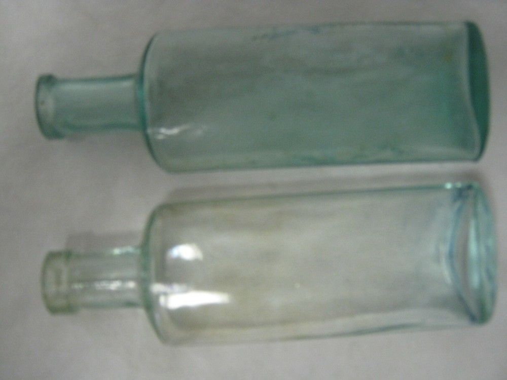 2 Vintage 5" Aqua Blue Bottles