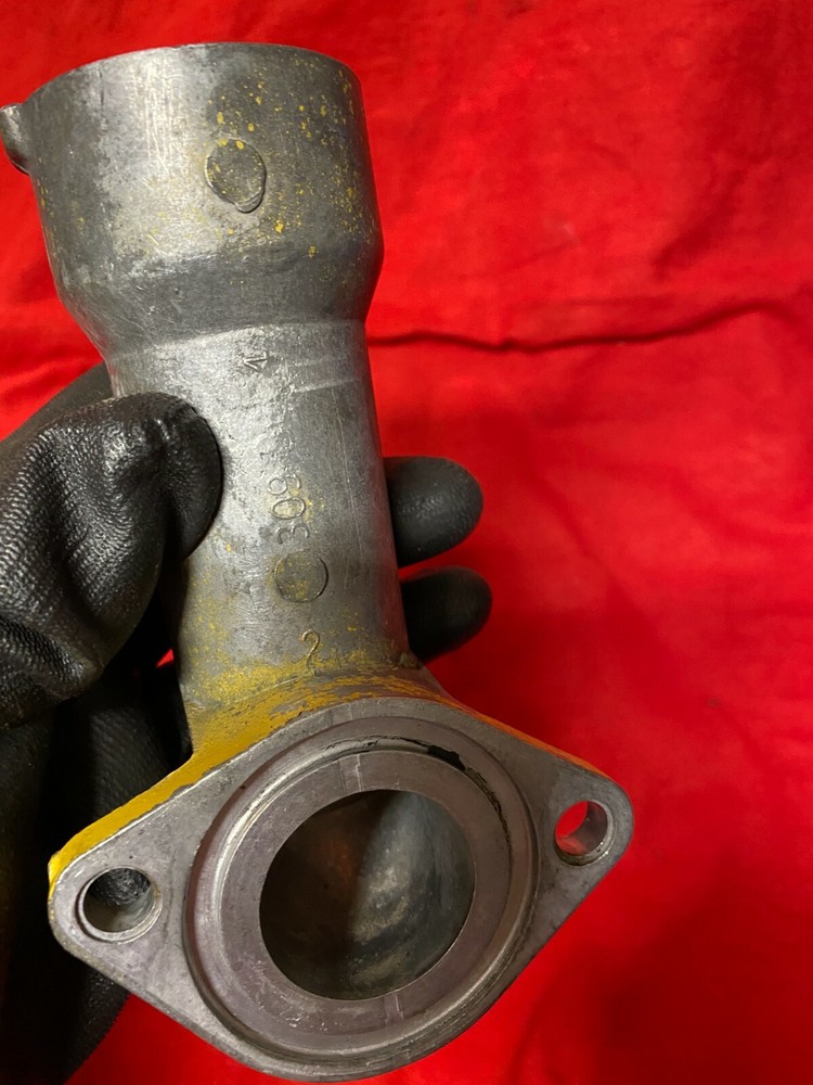 USED: Caterpillar C15 ACERT ENGINE WATER ELBOW