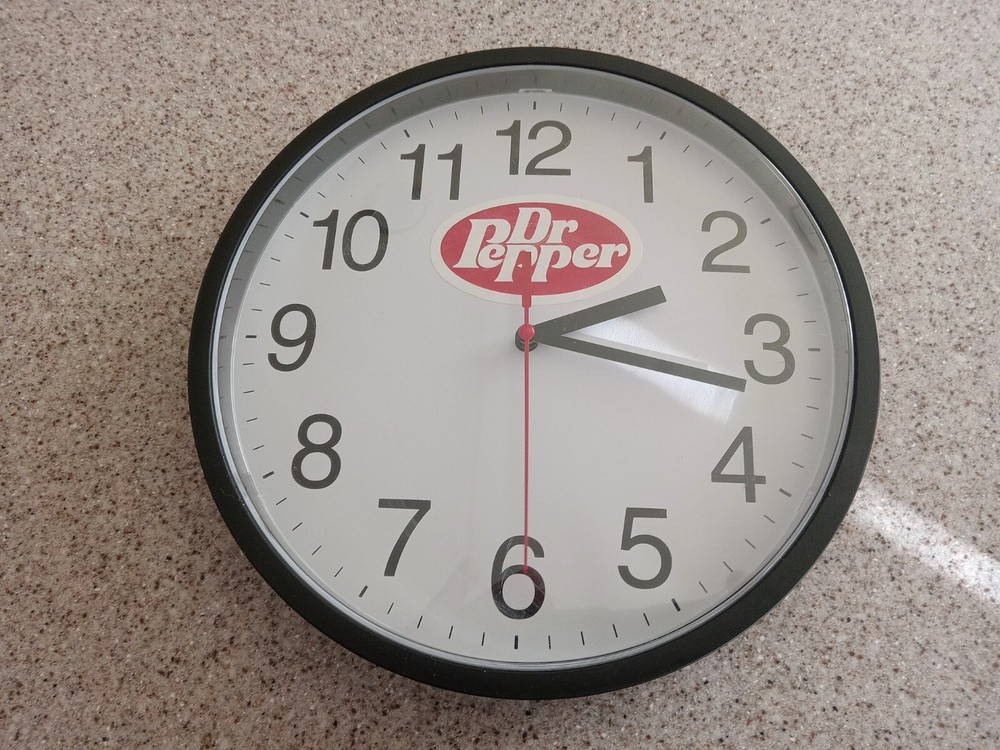 10" WALL CLOCK WITH ADDED DR PEPPER ADVERTISING STICKER