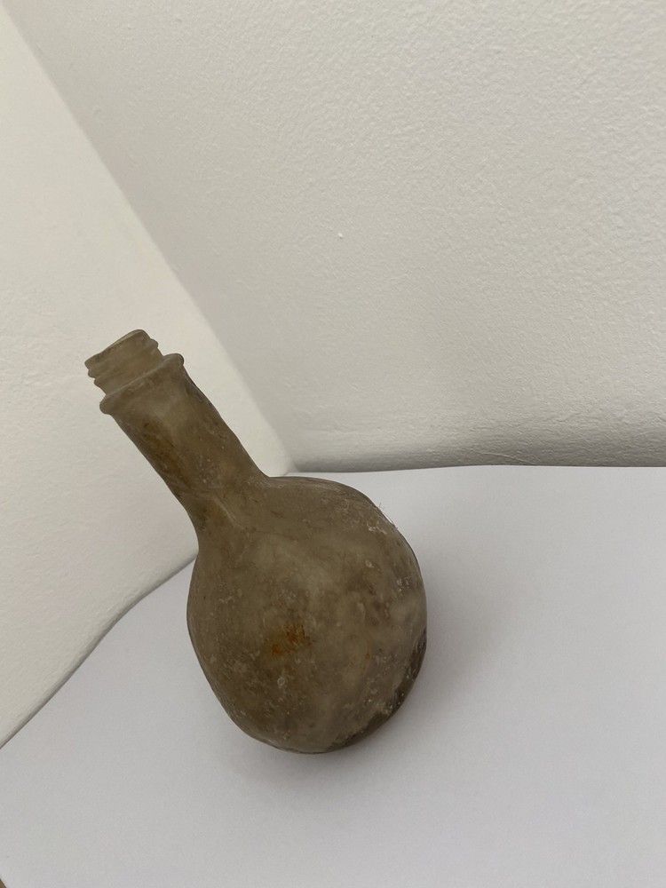 OLD Deformed glass bottle