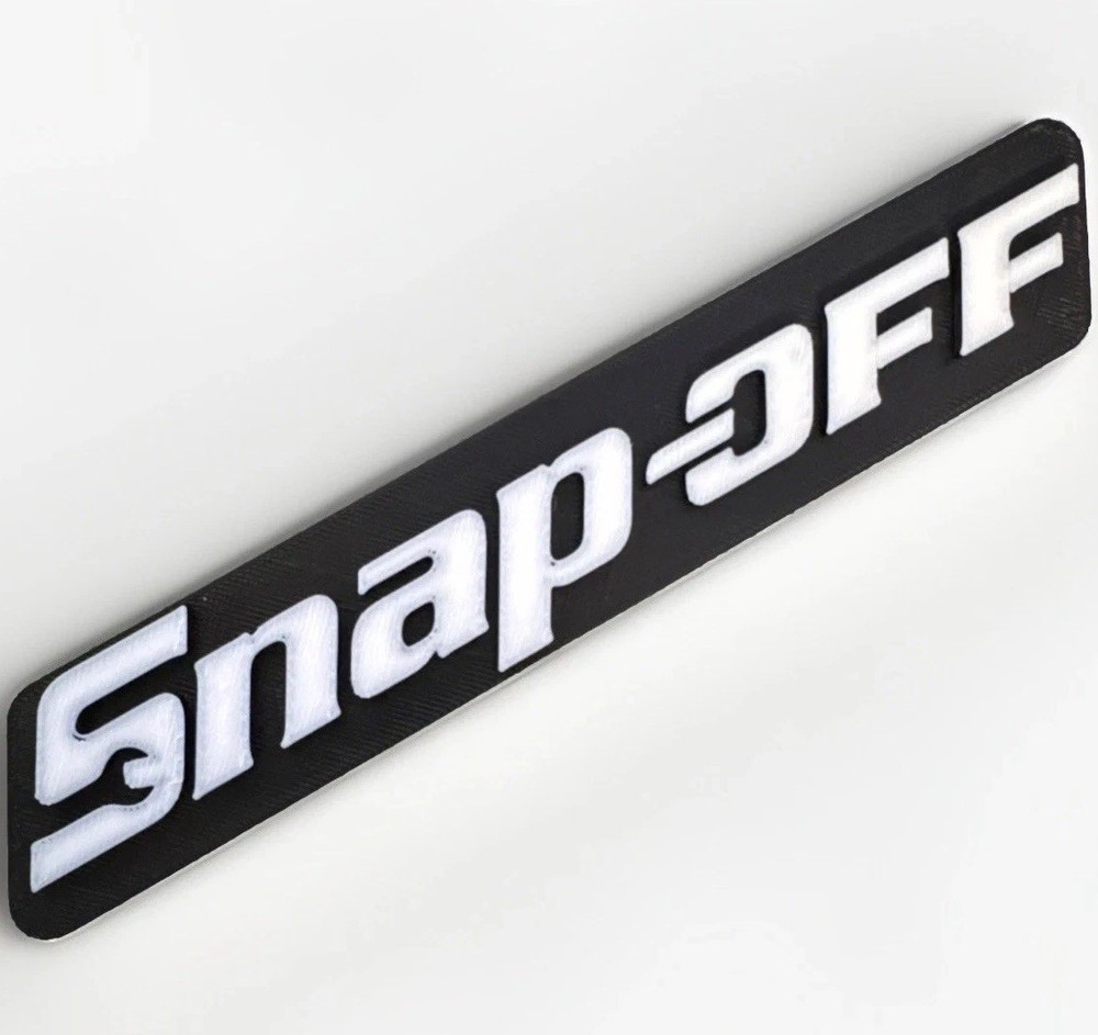 Snap-off Novelty 3D Printed Tool Box Badge.