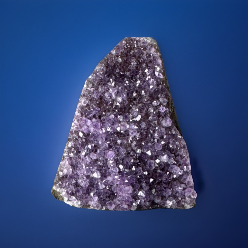 Amethyst crystal cut base 4" high x 3.25" wide