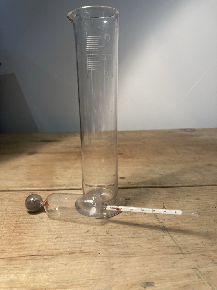Early 19th Century Hydrometer and Glass Measure