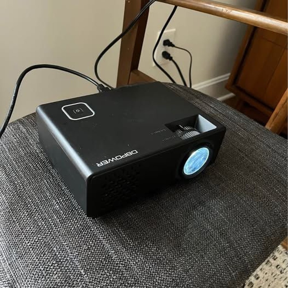 DBPower LED Light Source Mini Projector Includes Remote and Power Cord