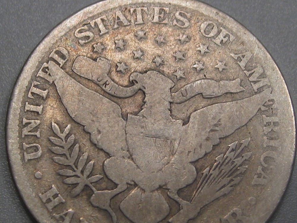 Better-date 1896-o Silver BARBER Half Dollar.
