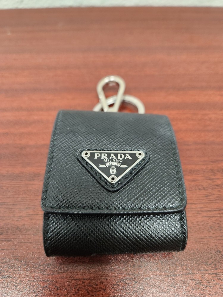 PRADA AirPods case, with triangular logo and Saffiano leather