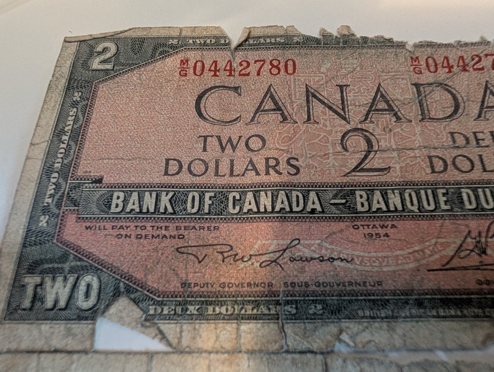 $2 Canadian Note. $1 Bahamas Note