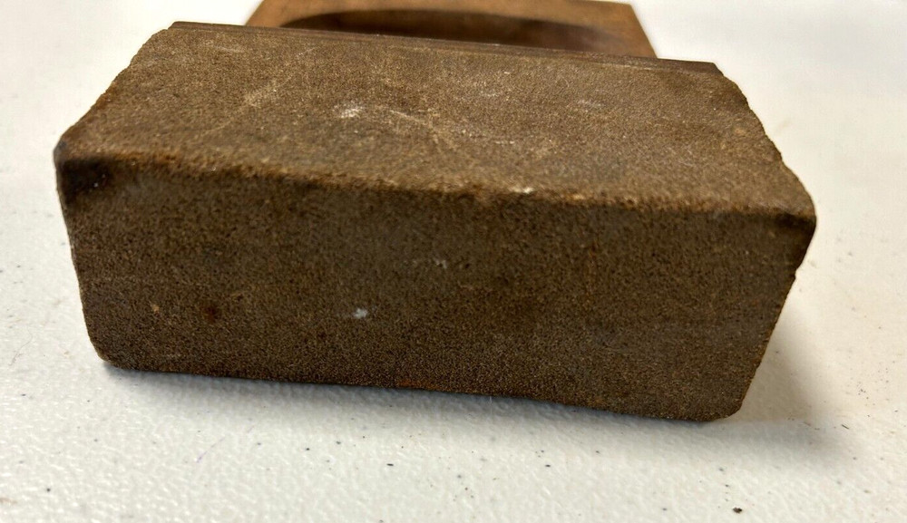 Vintage Sharpening Stone with a Wooden Grip Handle