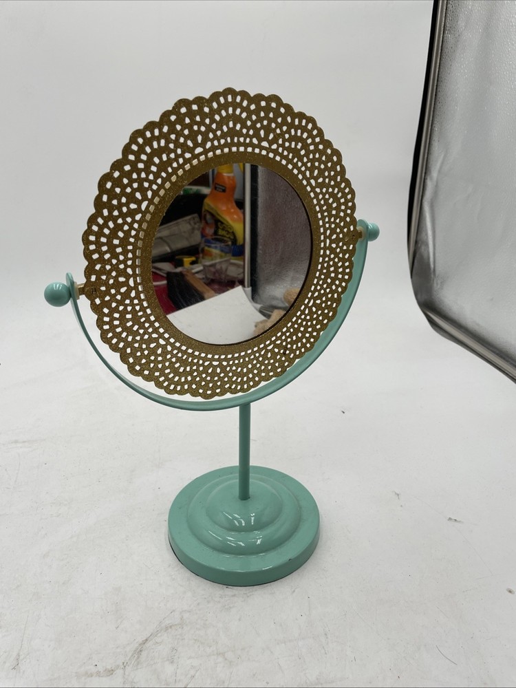 Vintage Tabletop Mirror With Gold Frame And A Blue Base