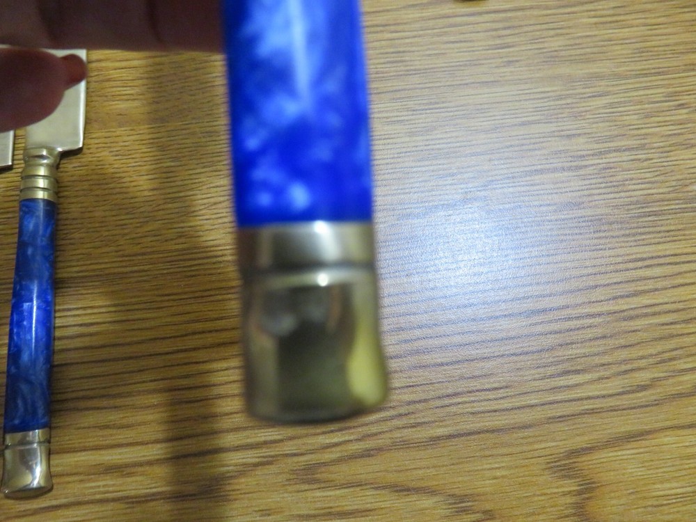 20 PIECE GOLD METAL BRASS? FLATWARE BLUE HANDLES SETTING FOR 4