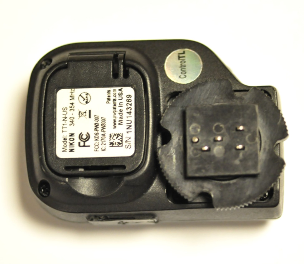 PocketWizard Mini TT1 transmitter for Nikon with instructions.