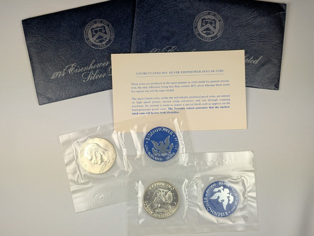 Two (2) 1974 Eisenhower 'Ike' Silver Dollars, Uncirc. Blue Envelope, 2 Coins