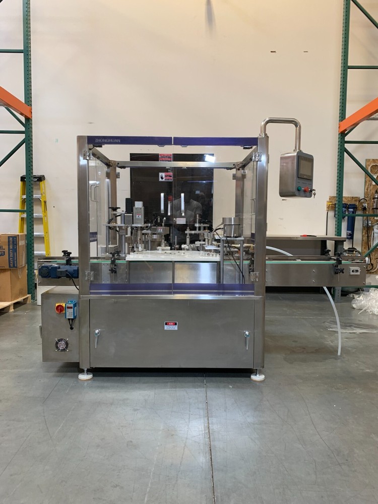 Automated Filling and Capping machine