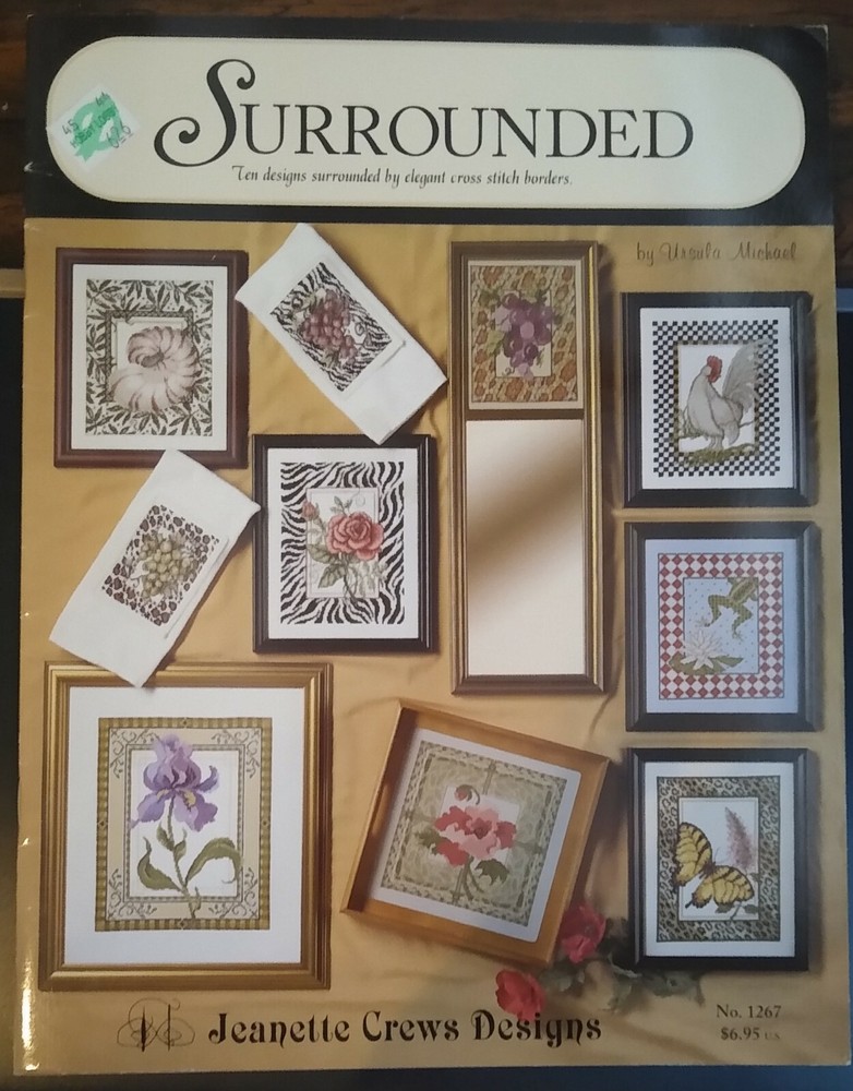 SURROUNDED  10 cross stitch patterns  with borders By Ursula Michael 2004