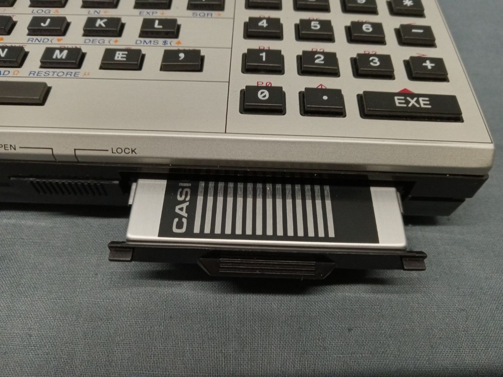 CASIO FX-820P Personal Computer With Charger Case and Manuals FULLY FUNCTIONAL!