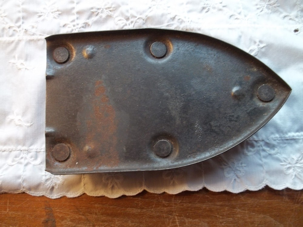 Antique Steel Sad Iron Trivet