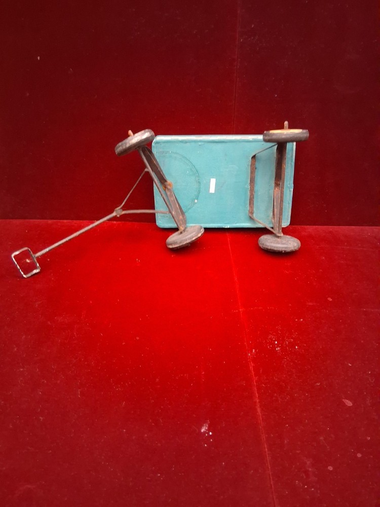 antique tin pull behind kids display cart