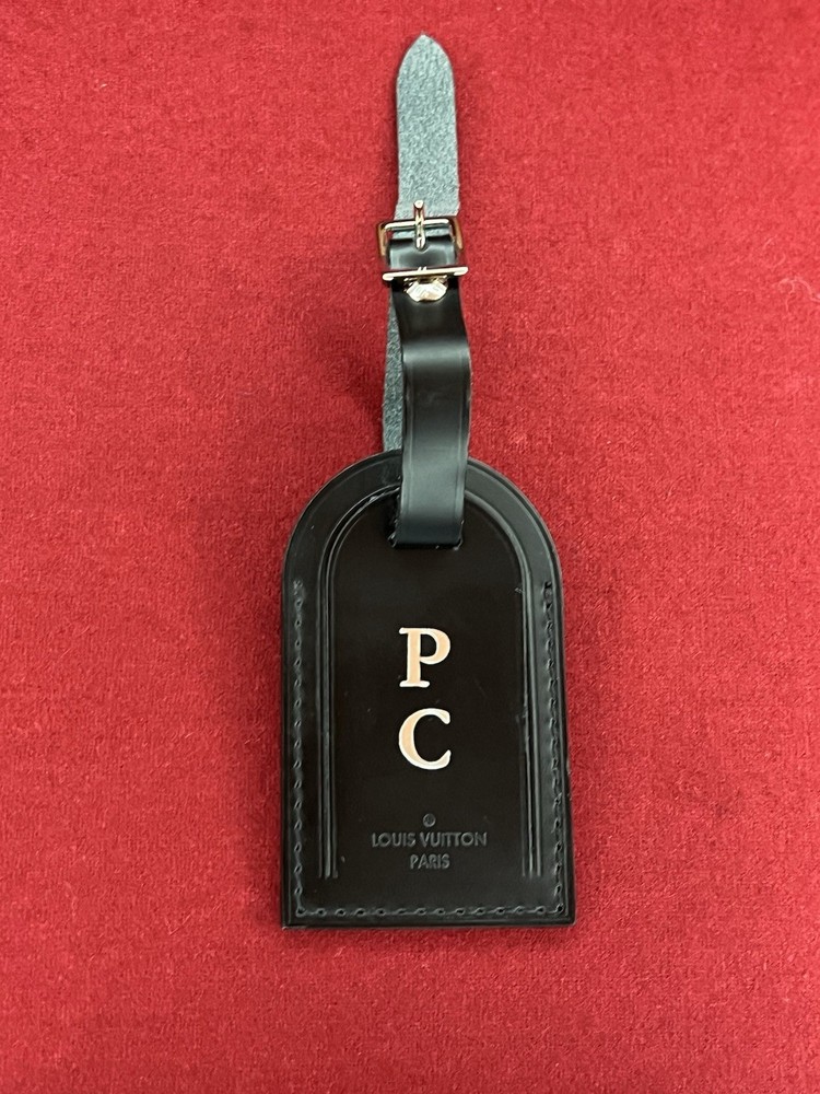 AUTHENTIC Louis Vuitton Black monogrammed leather luggage tag