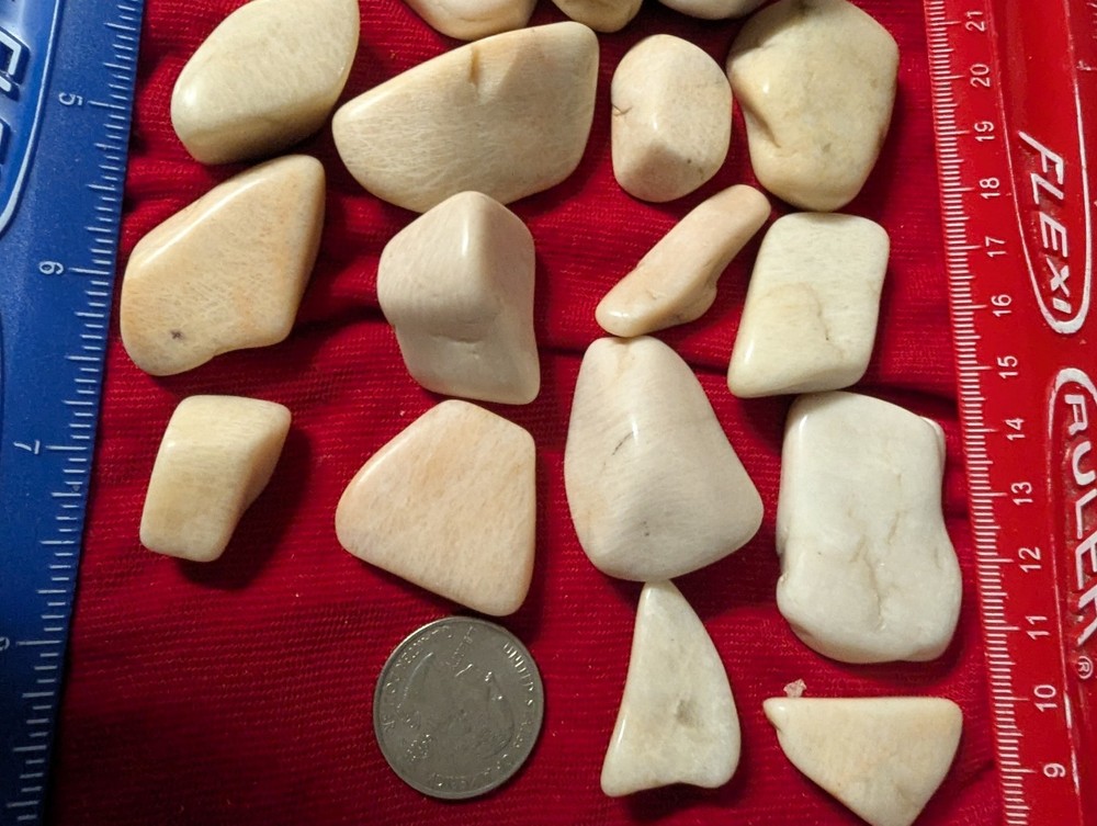2 Off white large tumbled gemstones per lot.