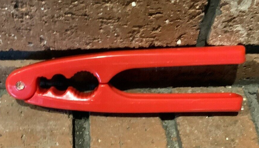 Nut Cracker Red Plastic Shell Cracker 6.5" Long