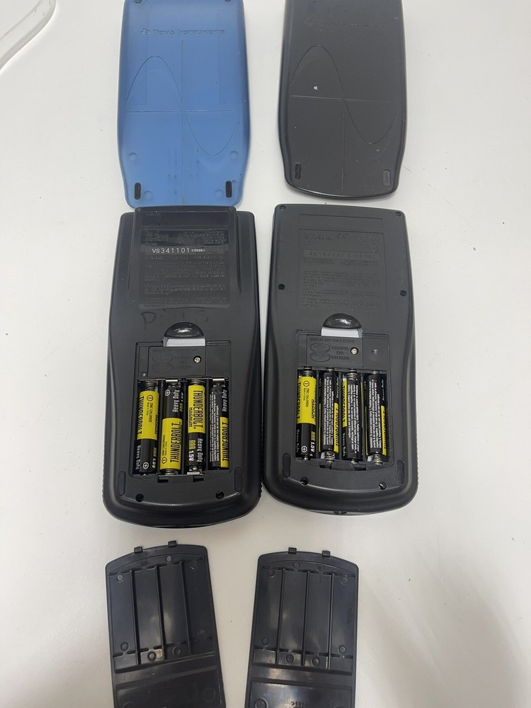 2 Texas Instruments TI-83 Graphing Calculators With Covers