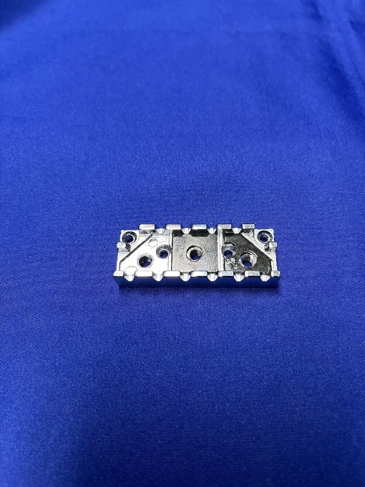 Locking Nut Wide Silver Base for an Electric Guitar