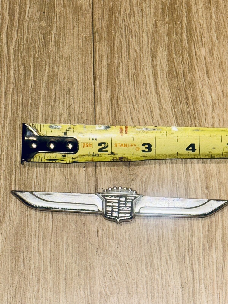 CADILLAC VARIOUS MODELS CIRCA '80S Silver EMBLEM GM 16502499