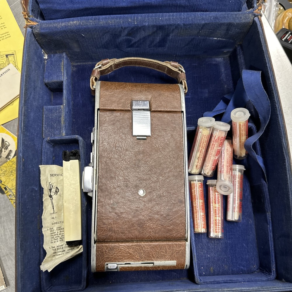 Polaroid land camera with case, Paper Work, Case Locks /Comes With Key. Model 95