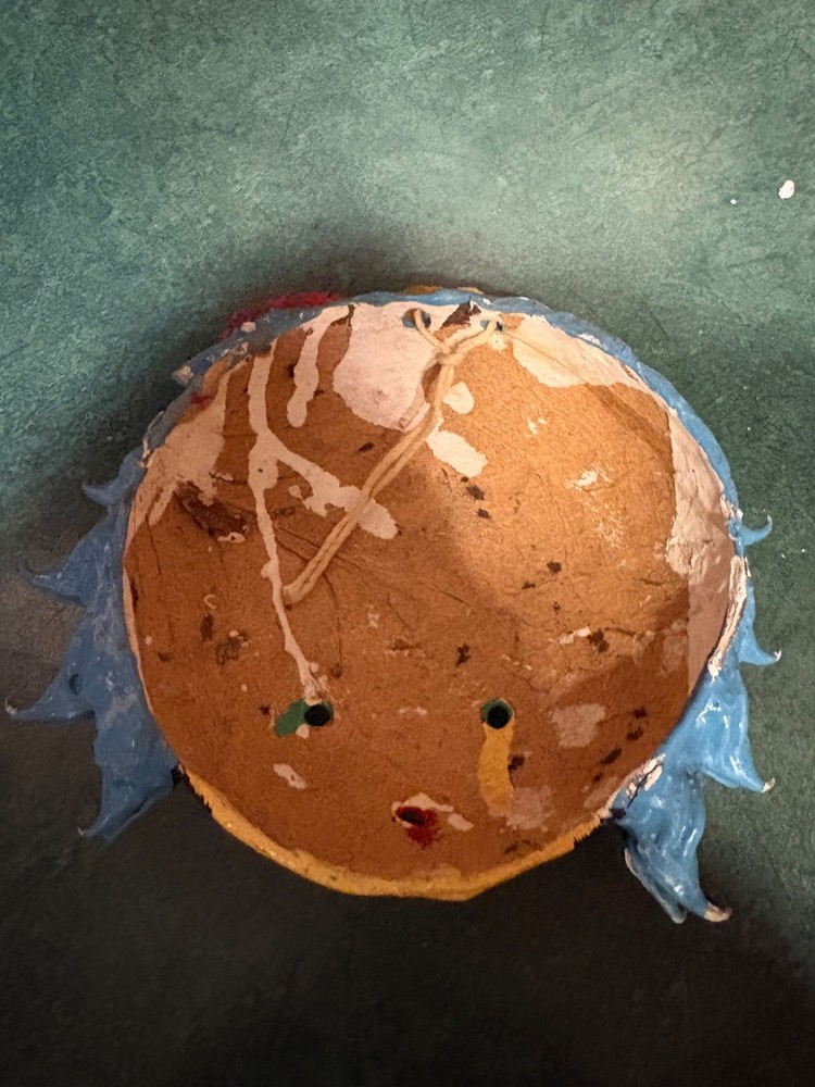 2 primitive string holders. Looks to be handmade.