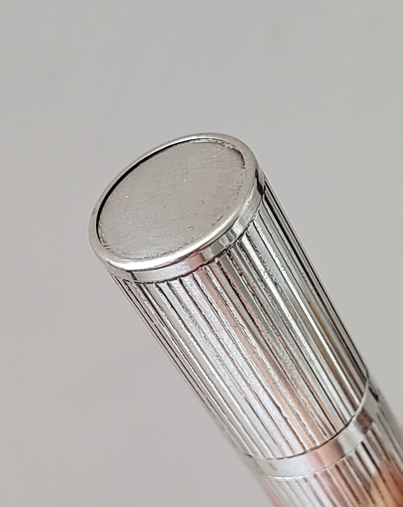 Perfume holder + makeup brush  