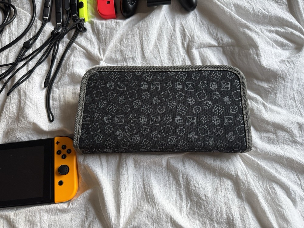 Nintendo Switch Bundle with Extra Joy-Con, Case, Dock, Cables, & Straps