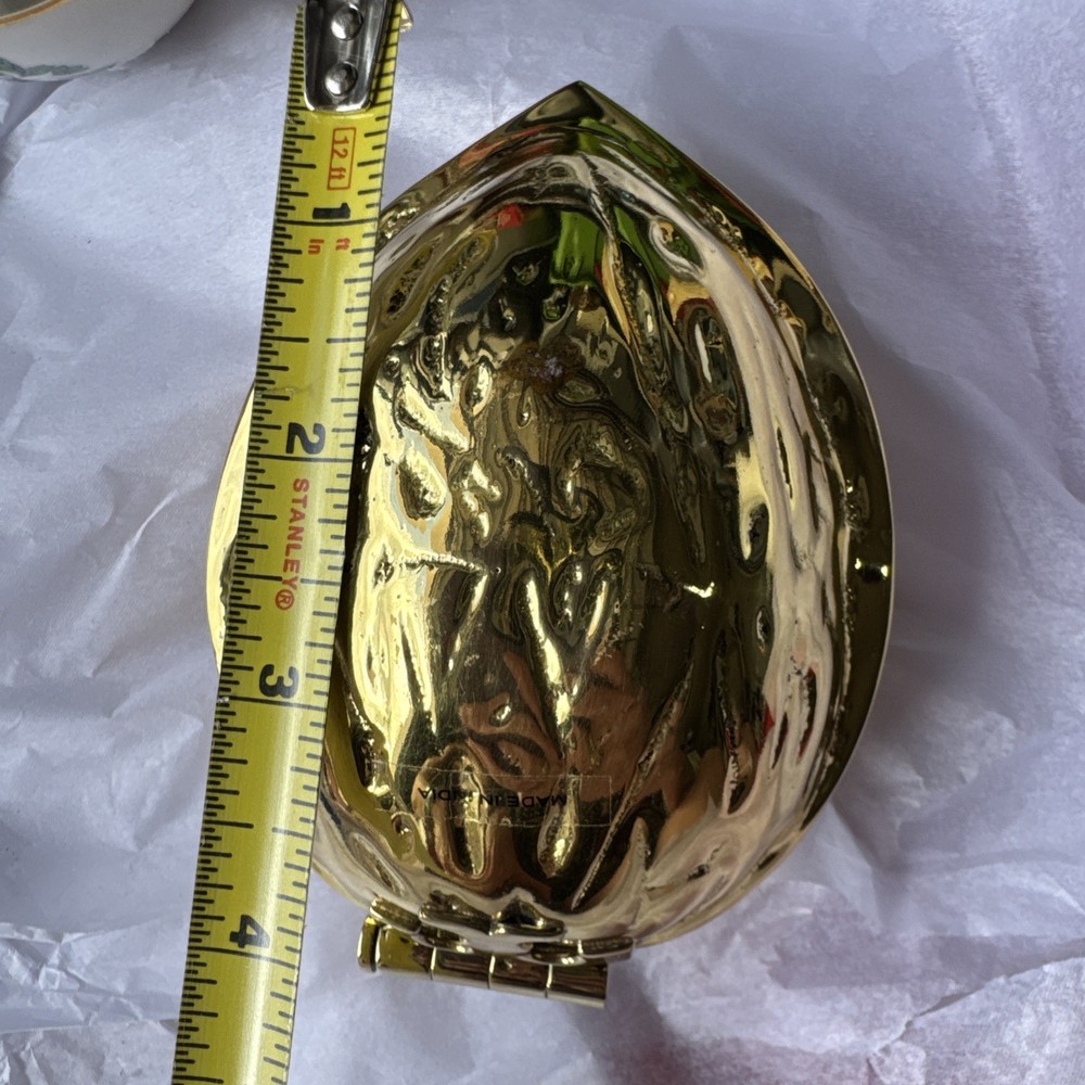 Tory Burch Brass "Robinson" Walnut Nutcracker