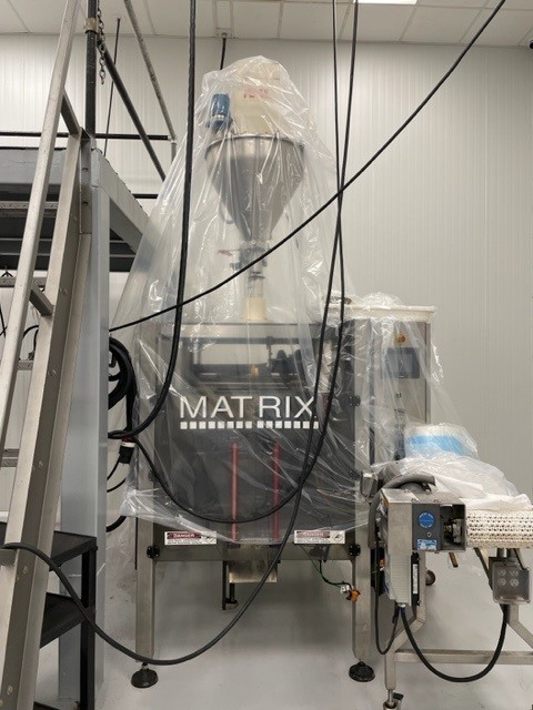 MATRIX FORM FILL AND SEAL MACHINE