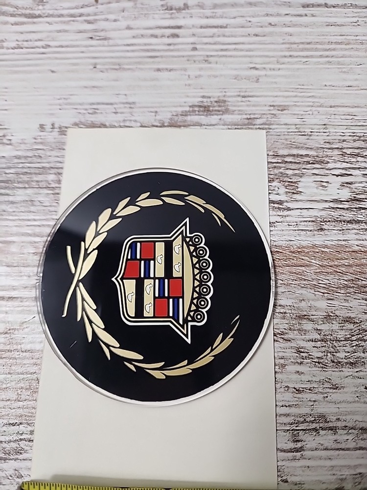 Black Background Cadillac Logo On Hard Plastic