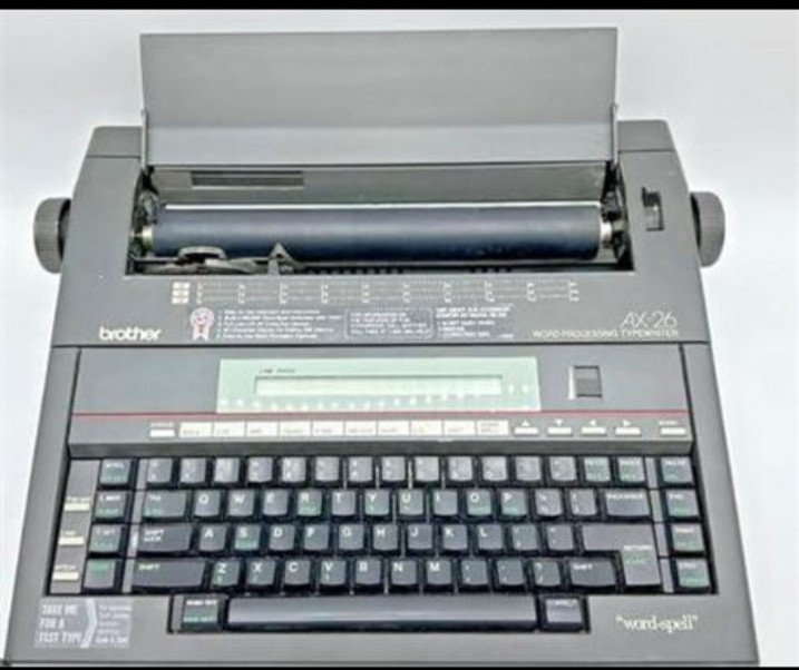Brother AX-26 Portable Electric Typewriter with Display TURNS ON DOESNT WORK