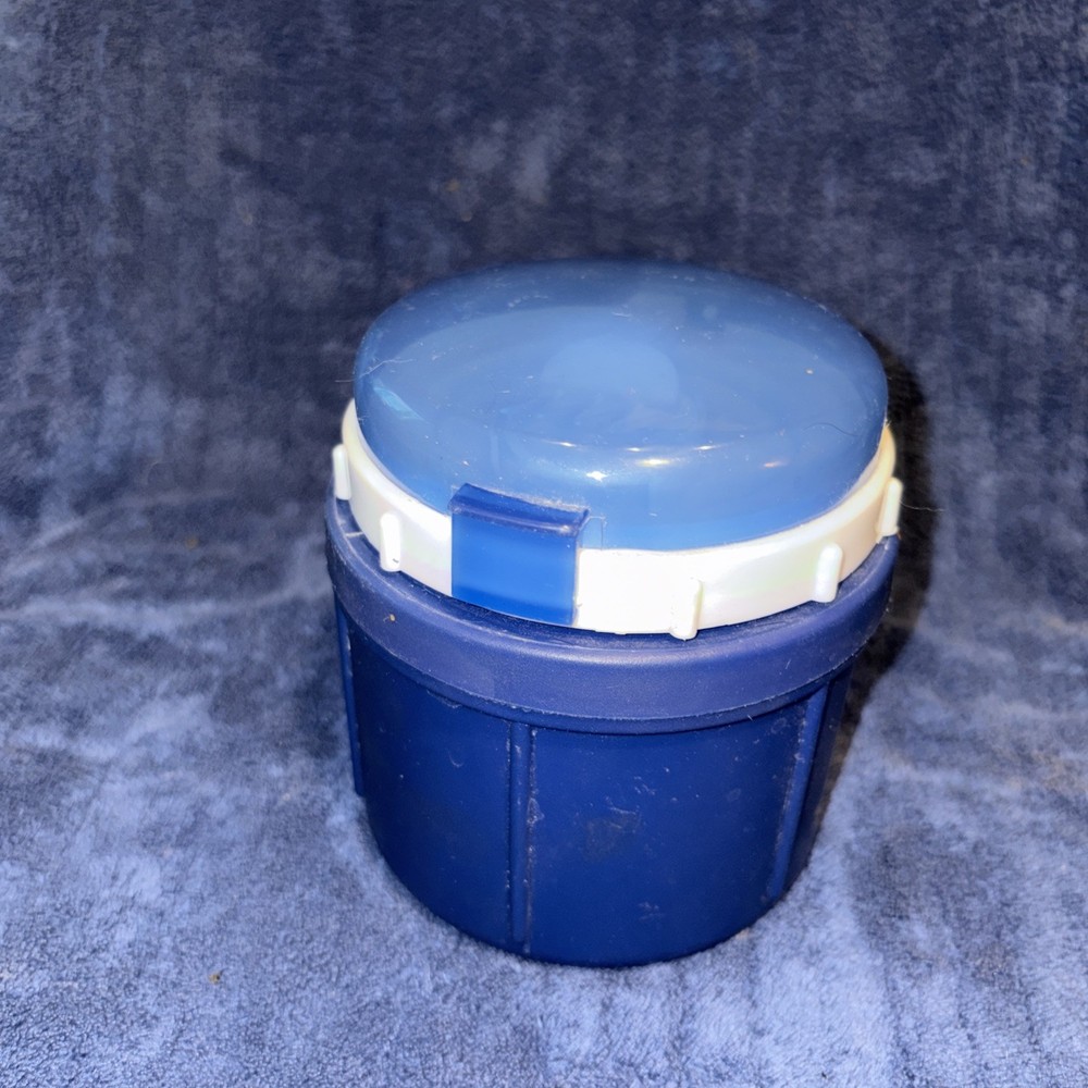Insulated Food Storage Container With Folding Spoon And Fork