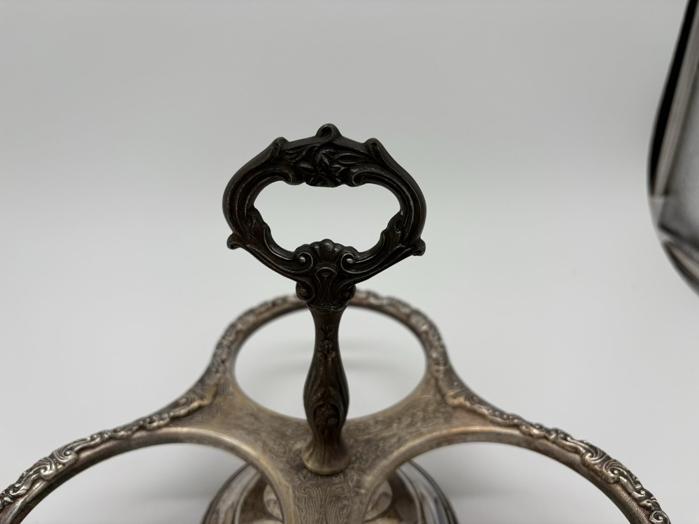 Vintage Sheridan silver-plated condiment caddy with ornate scrollwork