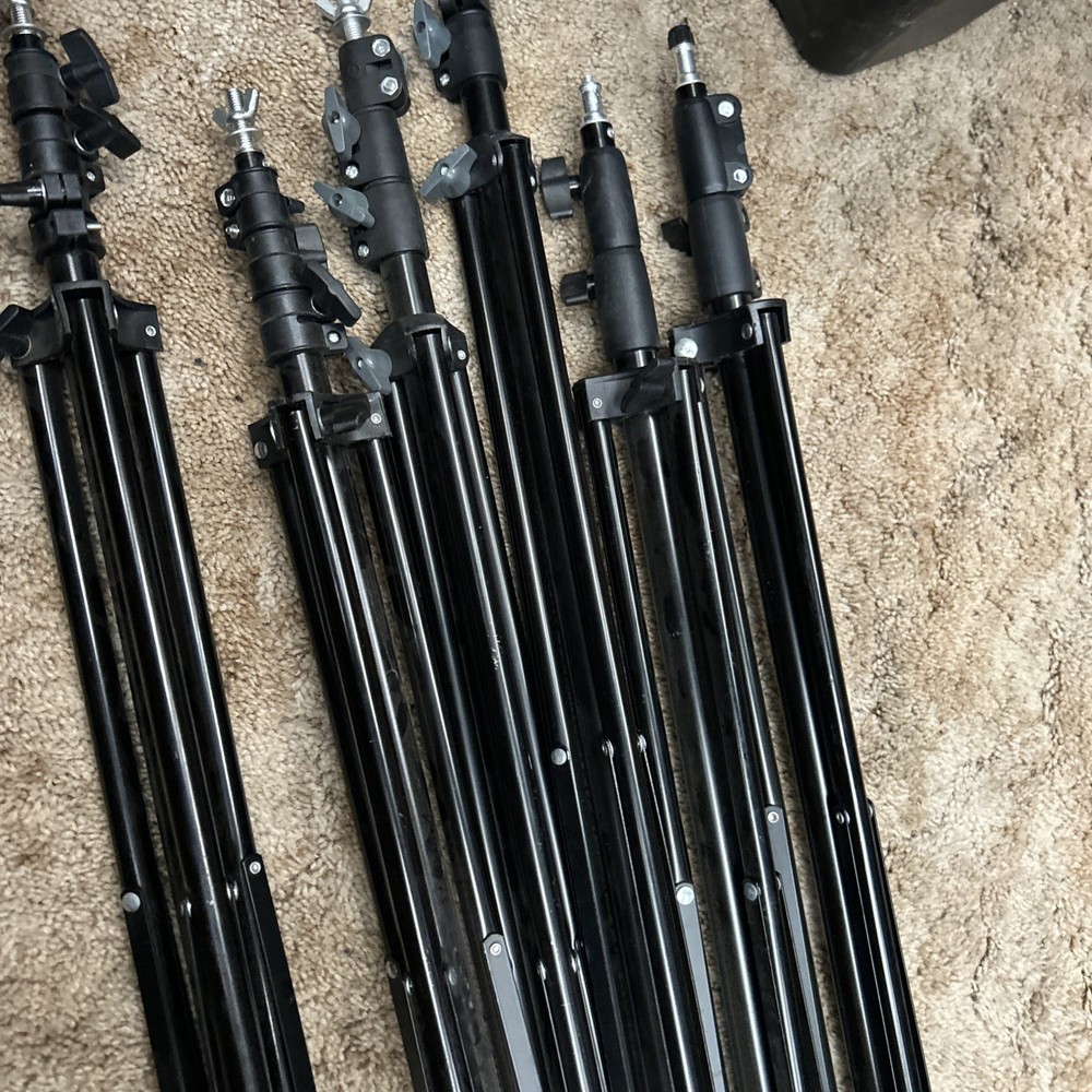 4 Neewer 200cm Light Stands - Slightly Used with two unknown brands