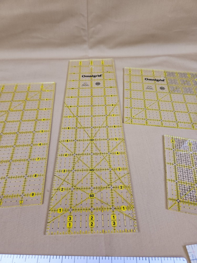 Assortment of Omnigrid measuring tools w/ Dritz Ezy-hem