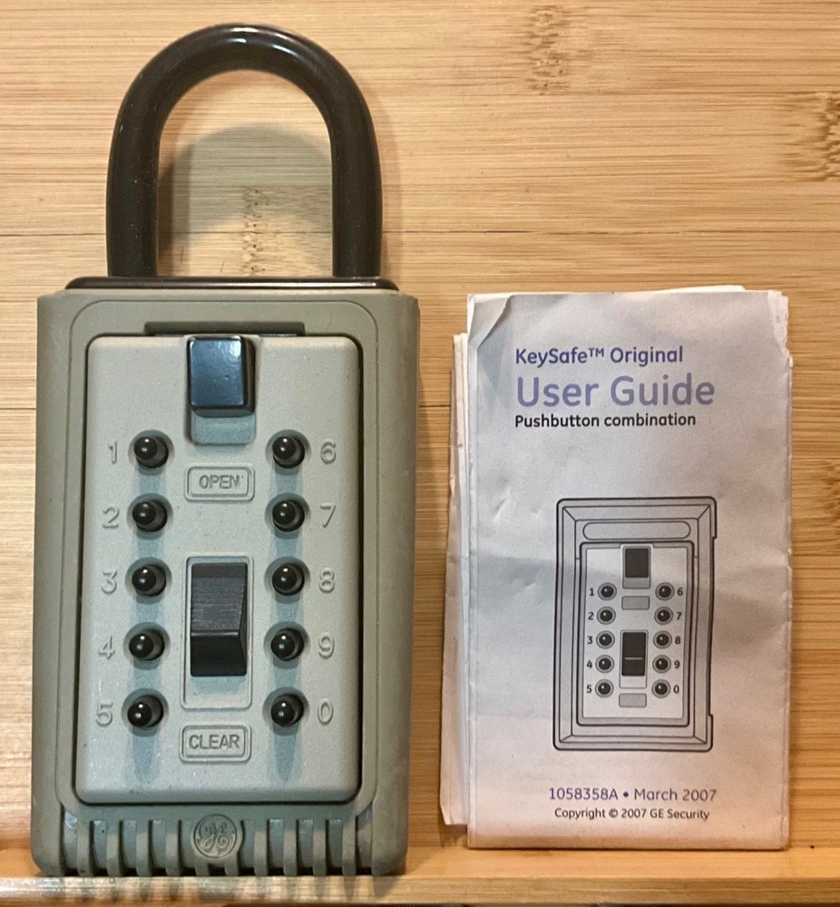 G.E. pushbutton Keysafe, new open box.