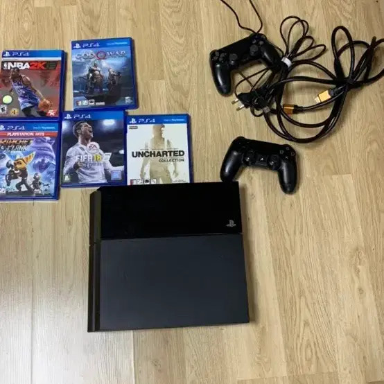 PS4 Console with DualShock Controllers and Games Official