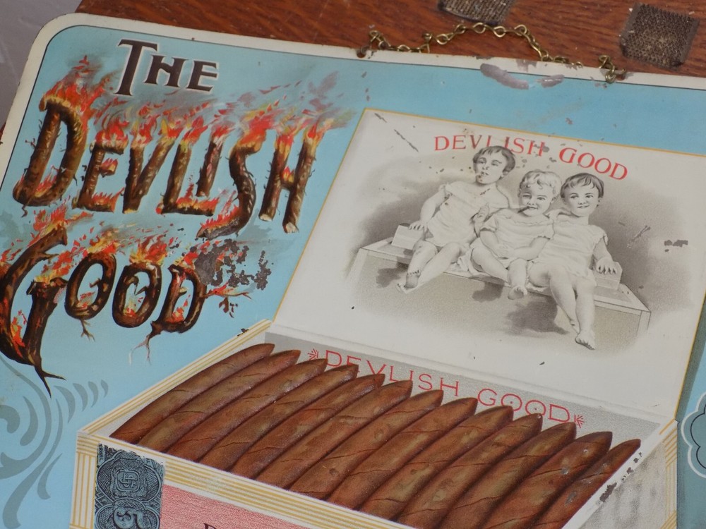 Vintage Devlish Good Embossed Cigar Metal Sign