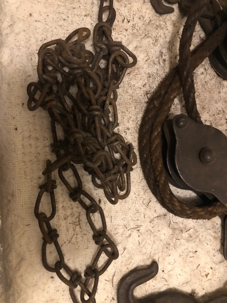 Antique primitive rope and chain hoist