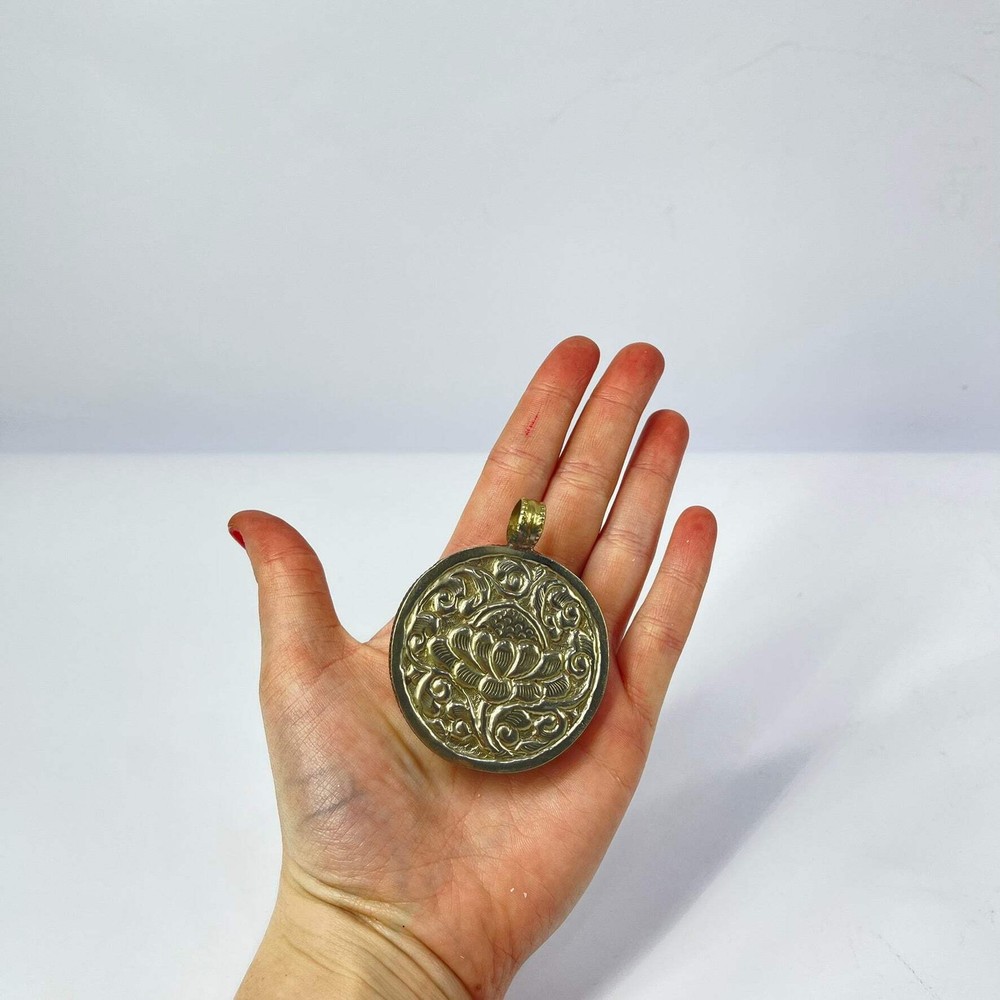 Tibetan Shell Repoussé Pendant