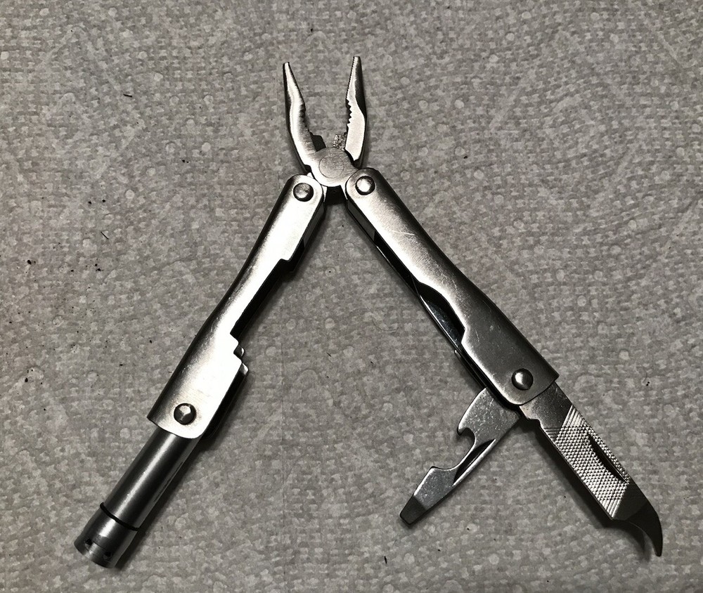 Unbranded Multi-tool, Pliers,saw knife & Battery Powered Light