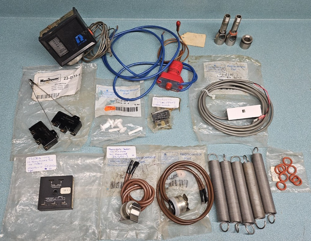 Assorted Manitowoc Ice machine parts.