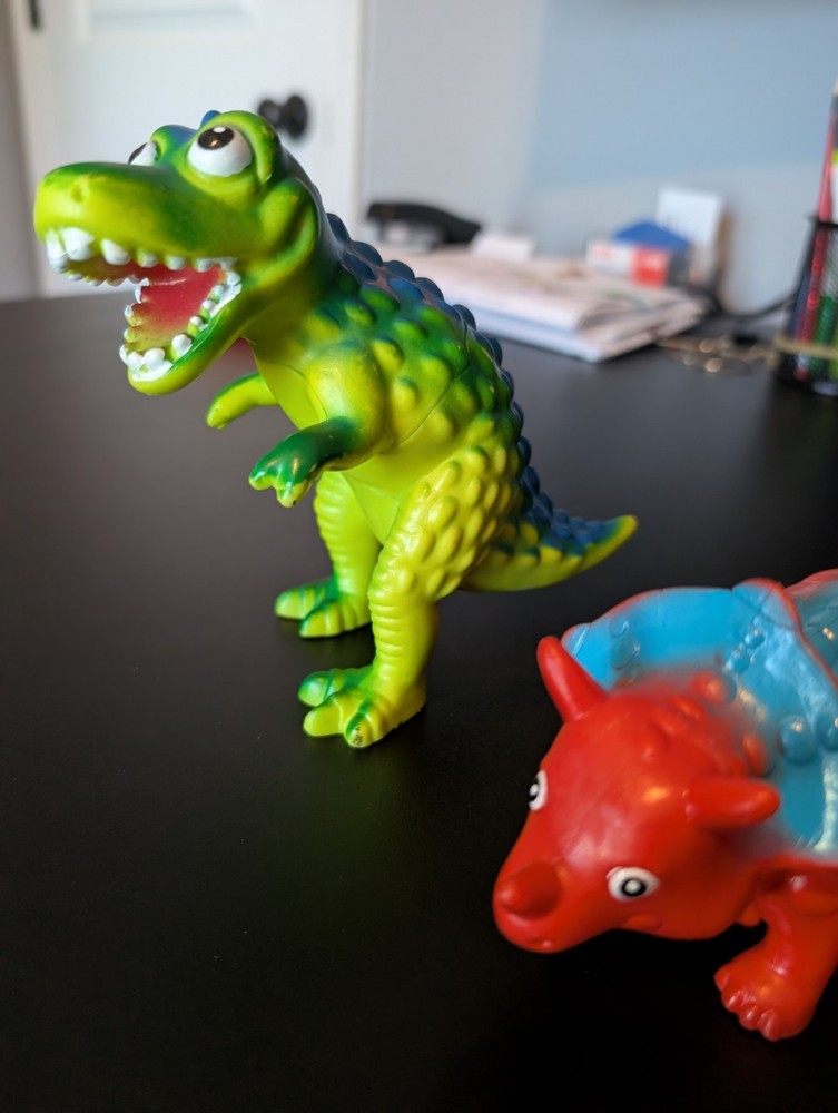 Two Plastic Toy Dinosaurs
