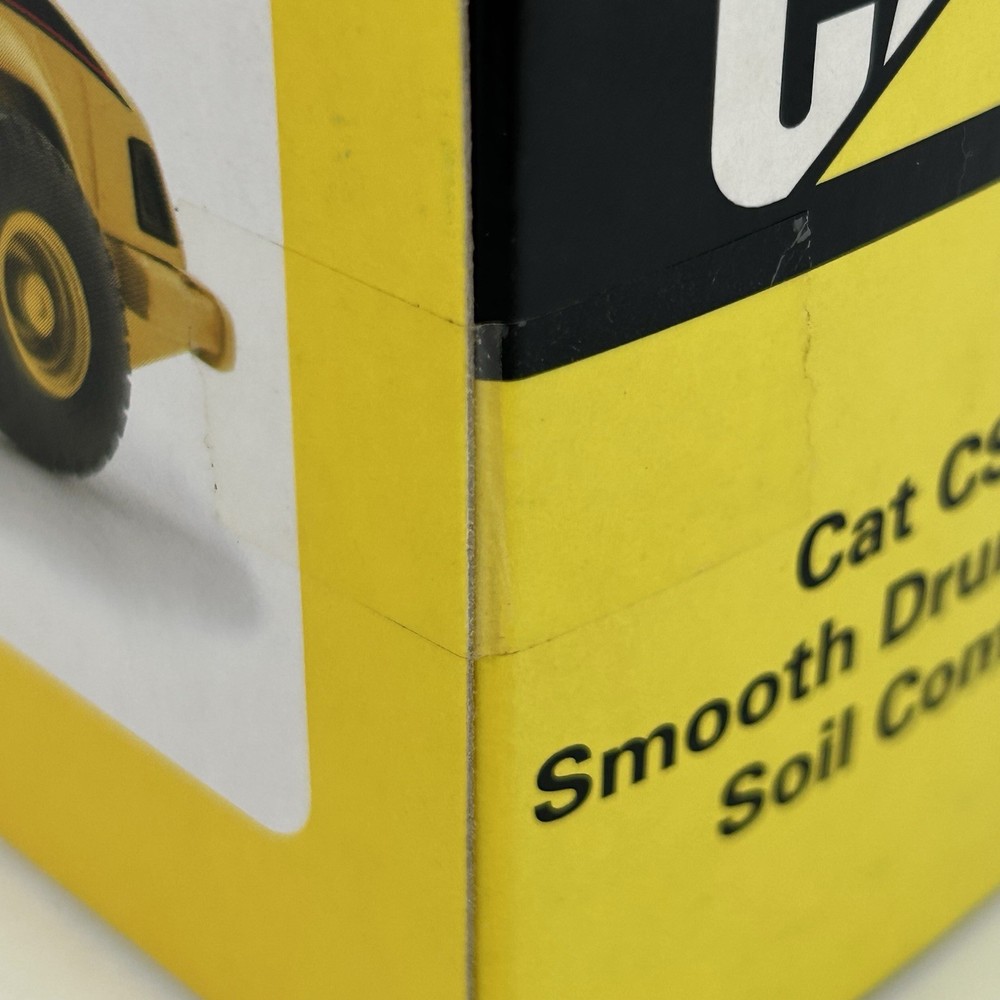 Norscot DieCast CAT CS-563E Smooth Drum Vibratory Soil Compactor 1:87 NIB
